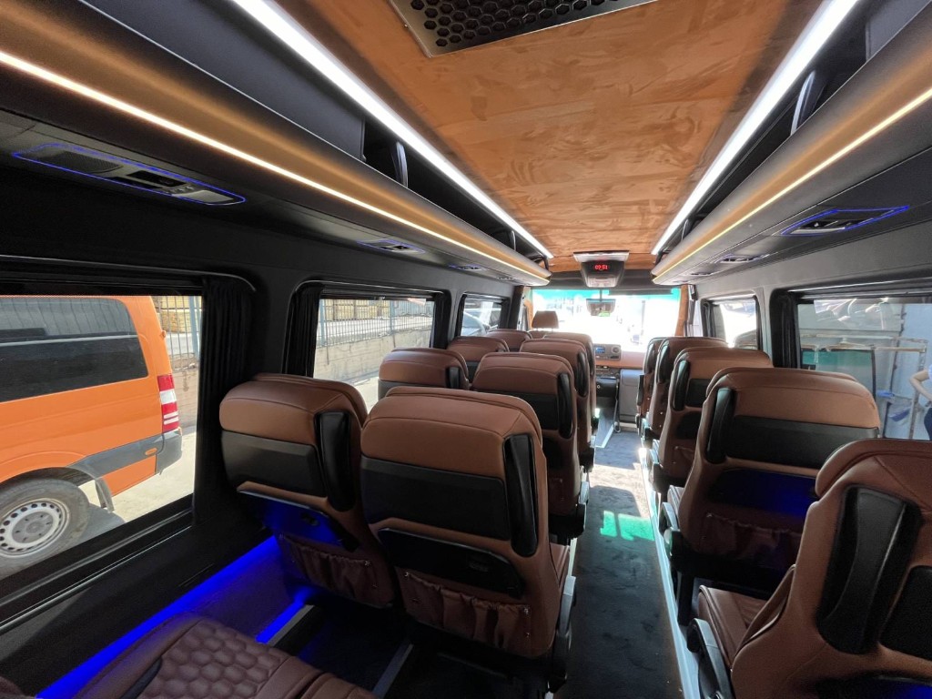 Coach cabin interior — spacious seating for large groups